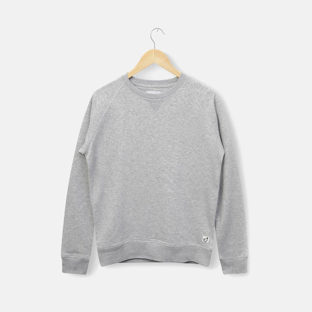 Flat lay of grey jumper incorporating hanger