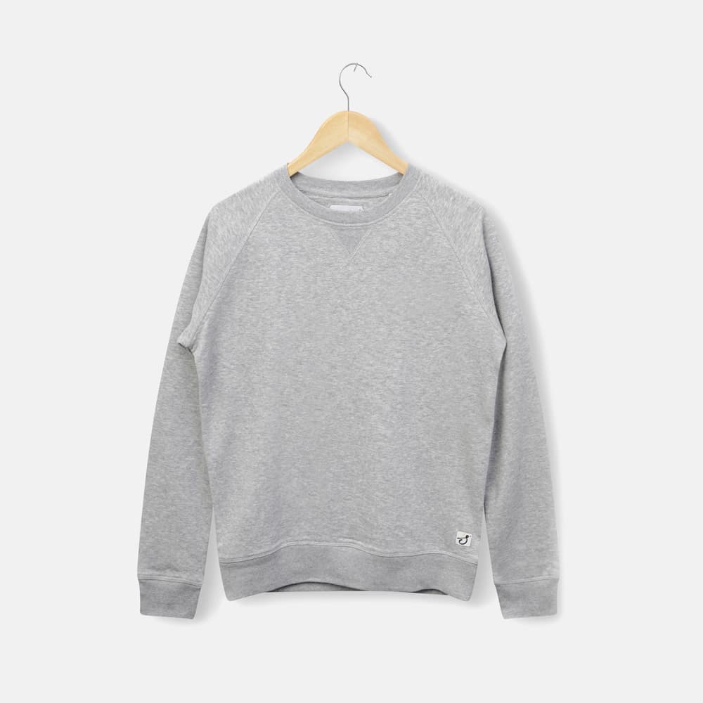 Flat lay of grey jumper incorporating hanger
