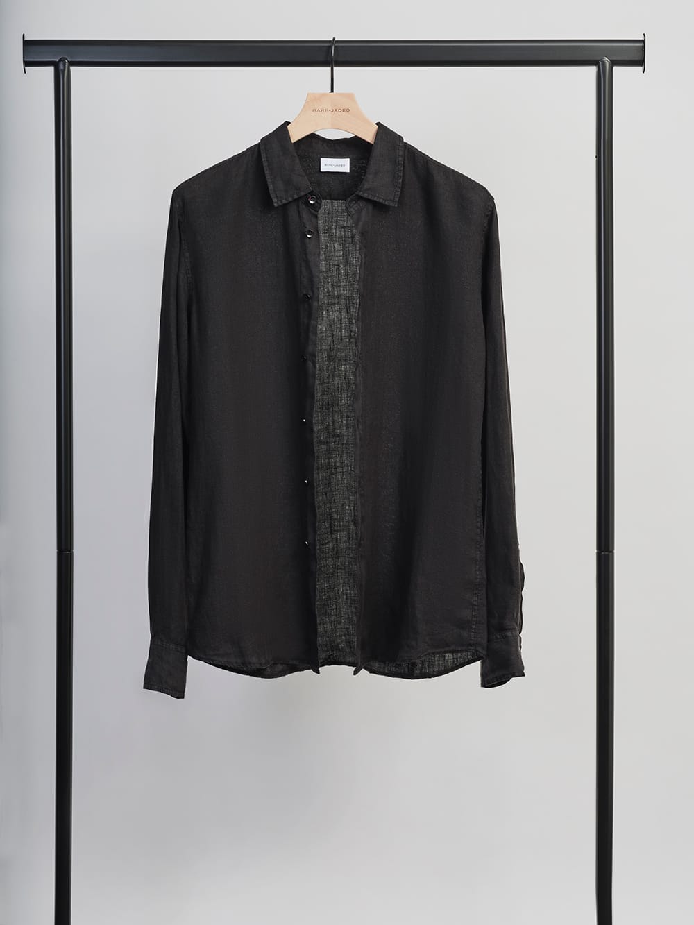 a shirt hanging in a photo shoot