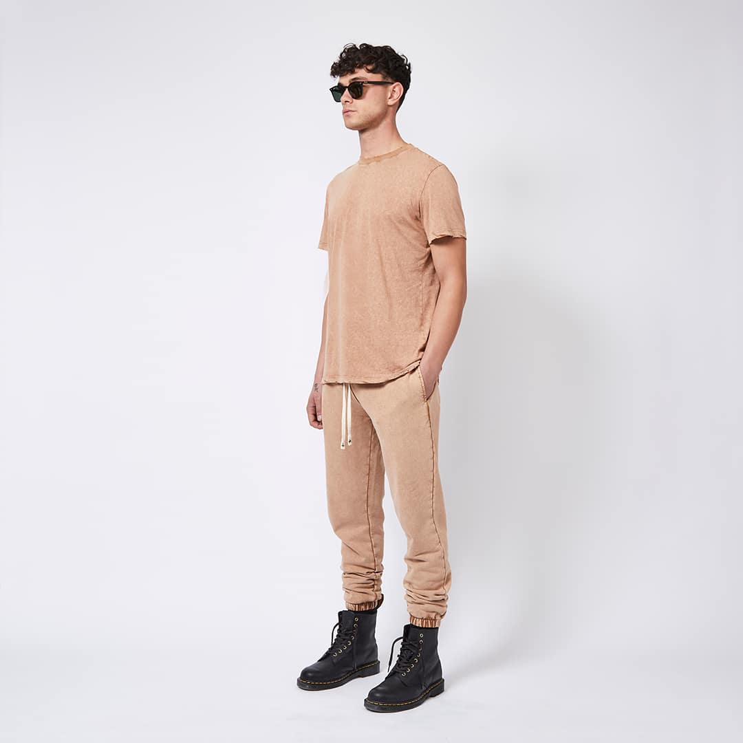 Male model with matching outfit and sunglasses